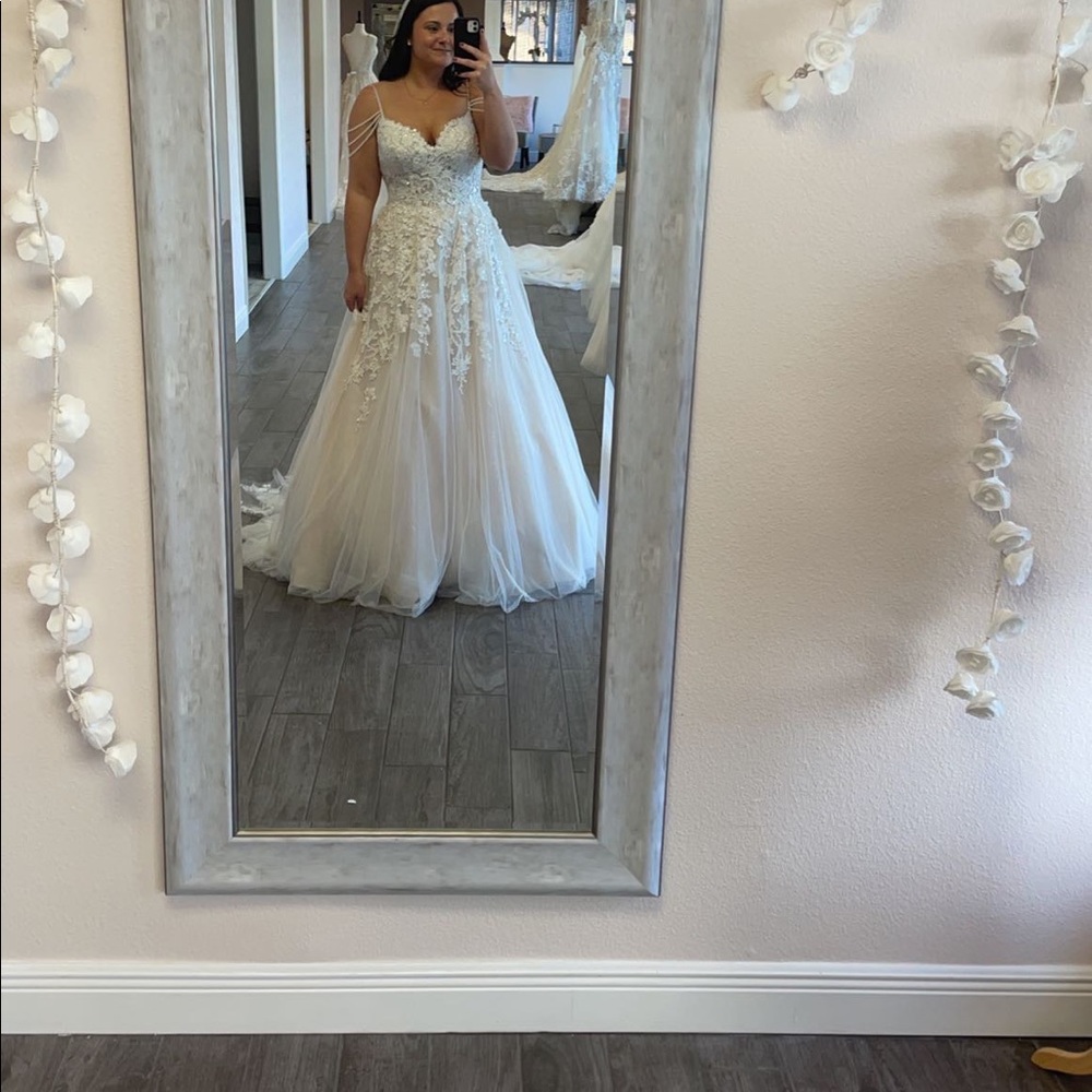 beautiful size 14 Stella York 2020 gown! Never altered and never put on!